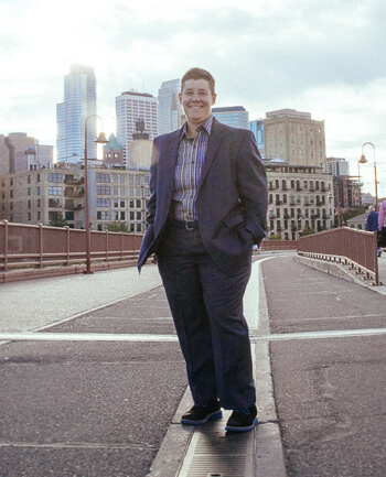 Chris Tymchuck with Minneapolis skyline in the background