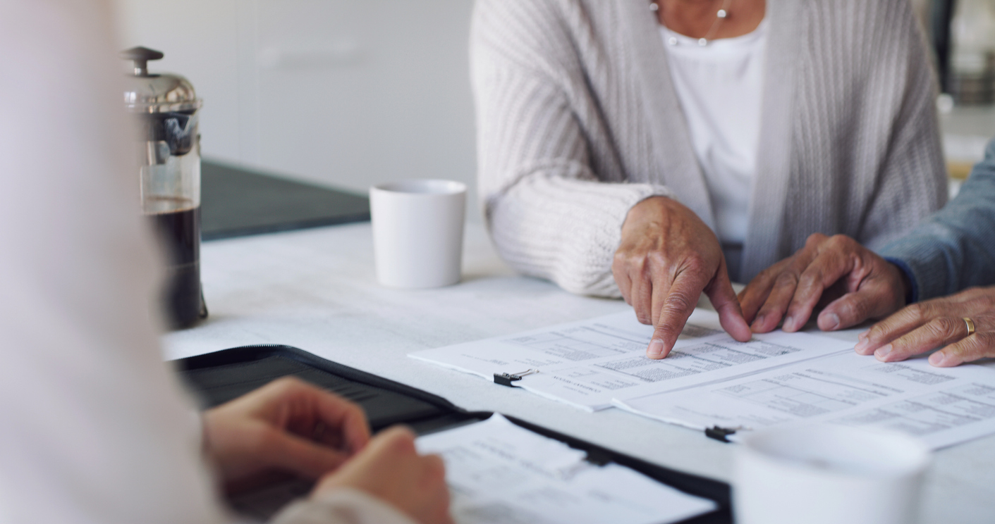 Older woman working on estate planning documents