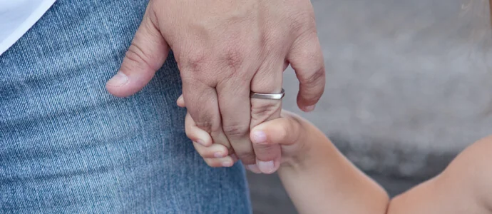 Chris Tymchuck's daughter holder her hand