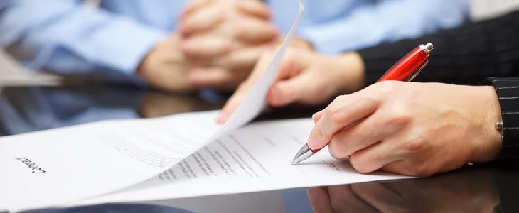 A man signing a will