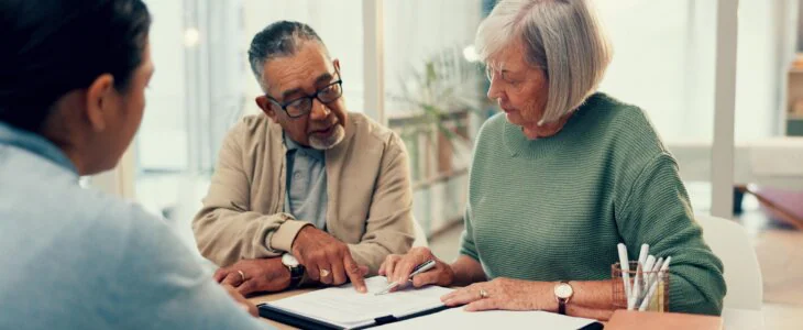 Talking, lawyer or old couple with will, contract or documents for life insurance papers or compliance.